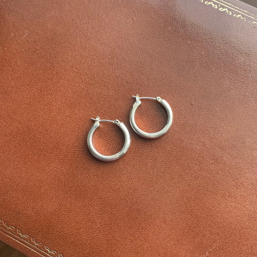 Classic silver chunky hoop. Excellent condition.